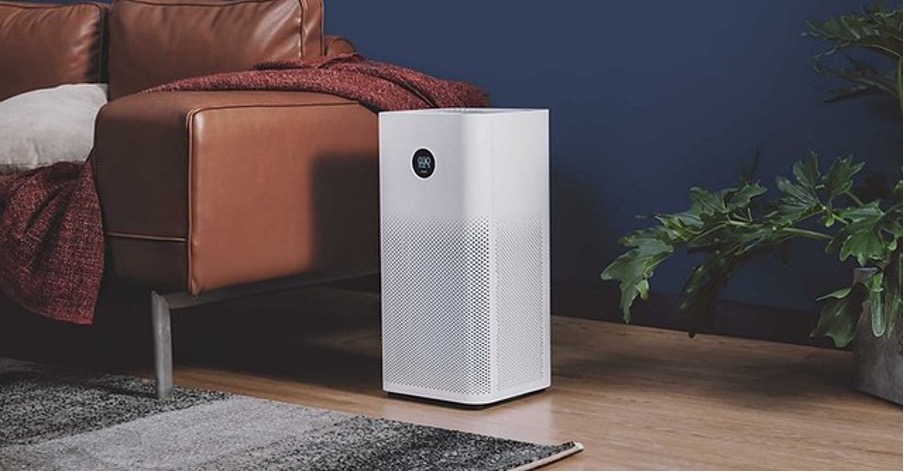 AIr Purifier next to a couch
